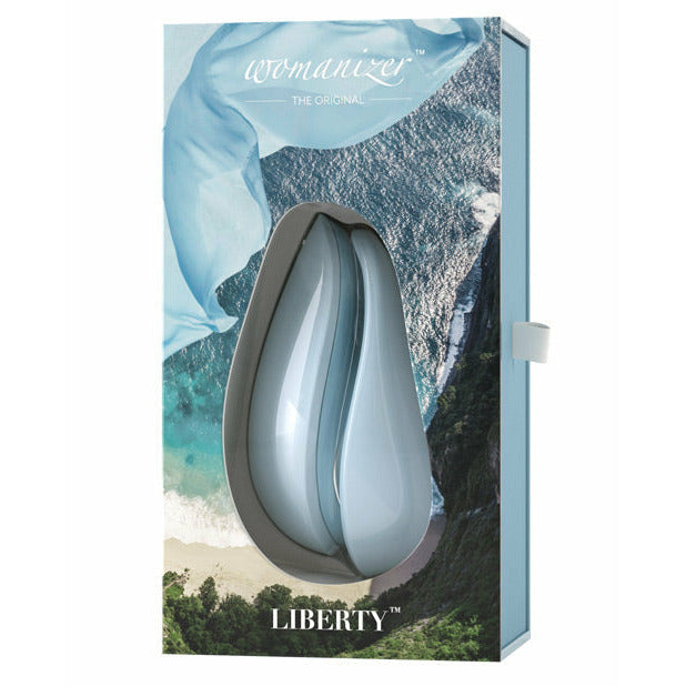 Womanizer Liberty sex toy in powder blue package - by The Bigger O online sex toy shop. USA, Canada and UK shipping available.